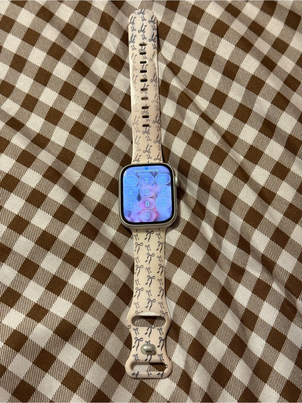 Apple Watch with Cream Silicone Band and Navy Bow Print